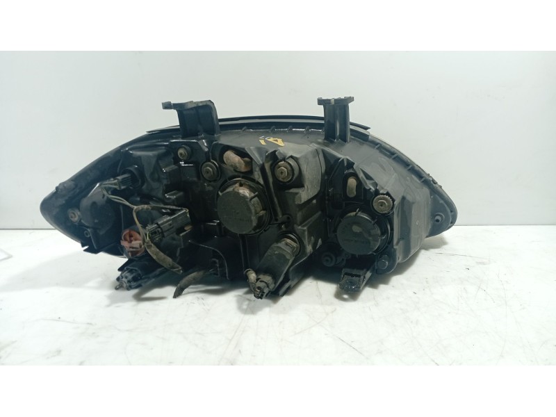 Recambio de faro izquierdo para ssangyong rodius i 2.7 xdi referencia OEM IAM 8310121201  