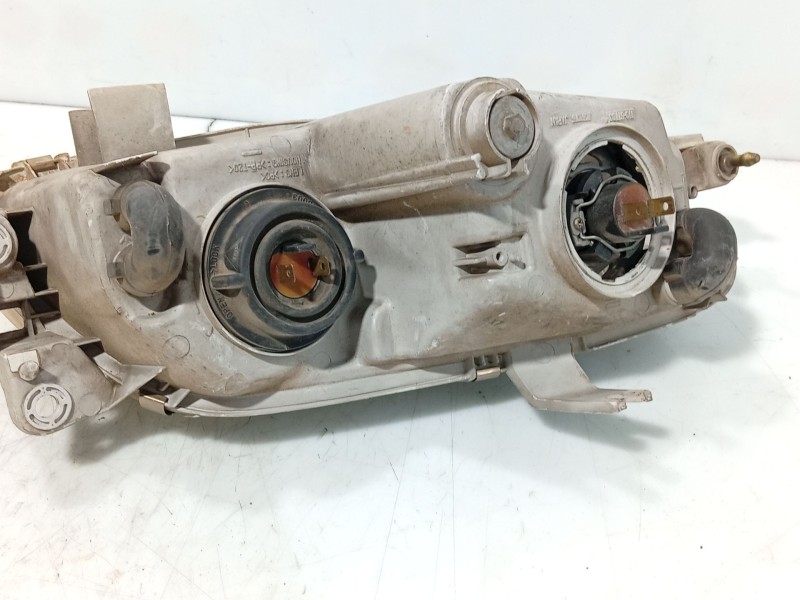 Recambio de faro izquierdo para mazda 323 coupe 323 coupe cb4 referencia OEM IAM 0  