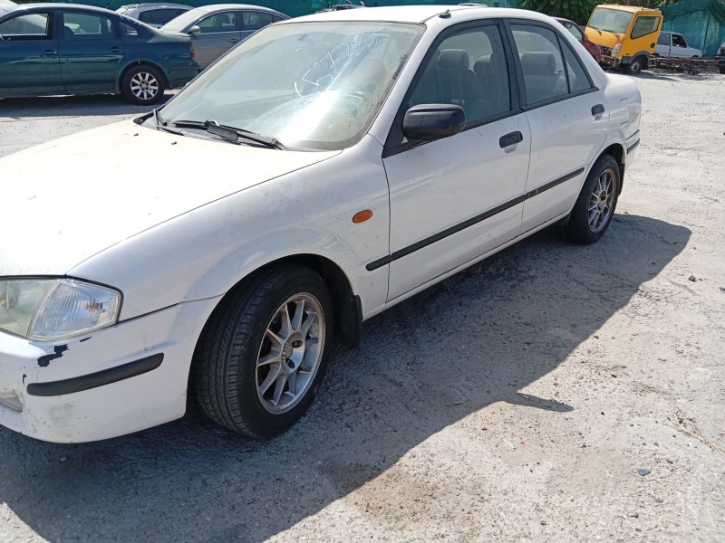 mazda 323 f vi hatchback (bj) del año 2004