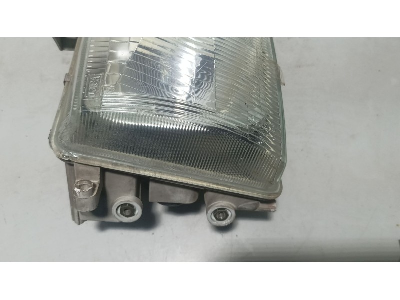 Recambio de faro izquierdo para nissan serena c23m referencia OEM IAM   